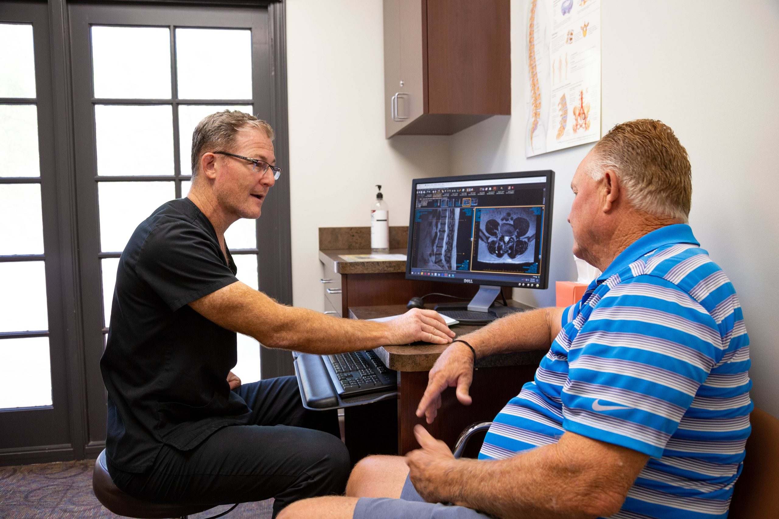 Dr. Justin Field Consulting with Patient