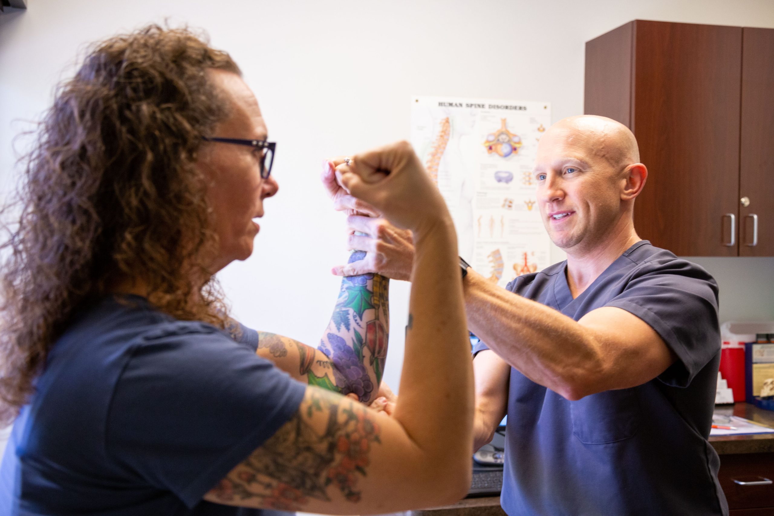 Dr. Joshua Abrams with a Patient